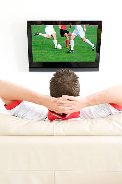 istock Man is watching a football match on tv 121544629