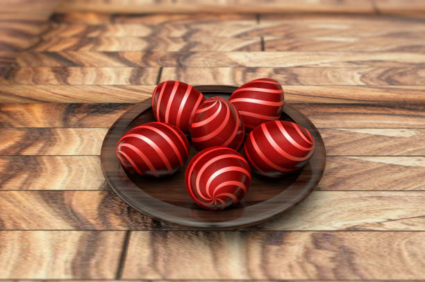 3D video of Red Easter eggs in a wooden plate around which the camera rotates. Plate with Easter eggs on a wooden parquet