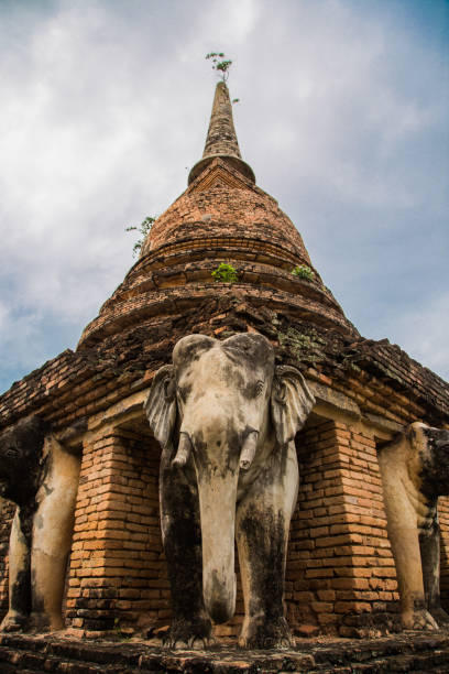 istock Buddha in Sukhothai historical park in thailand 1215450578