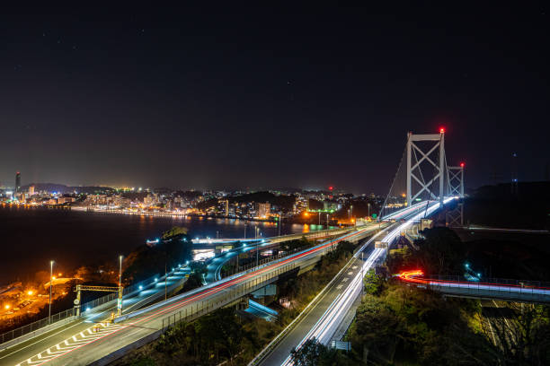 istock traffic in the city at night 1215452782
