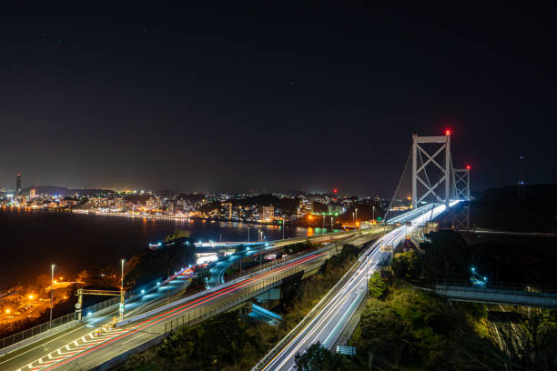 istock traffic in the city at night 1215452928