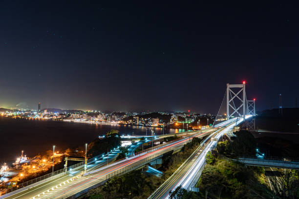 istock traffic in the city at night 1215453094