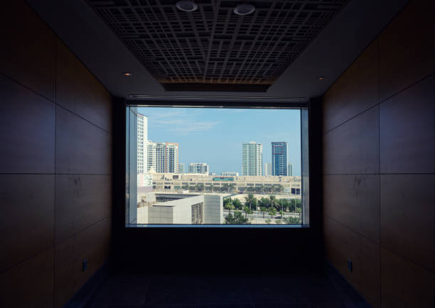 Window frame with buildings view background, Bahrain.