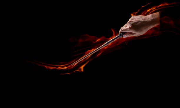 Magic wand with sparkle on blue background