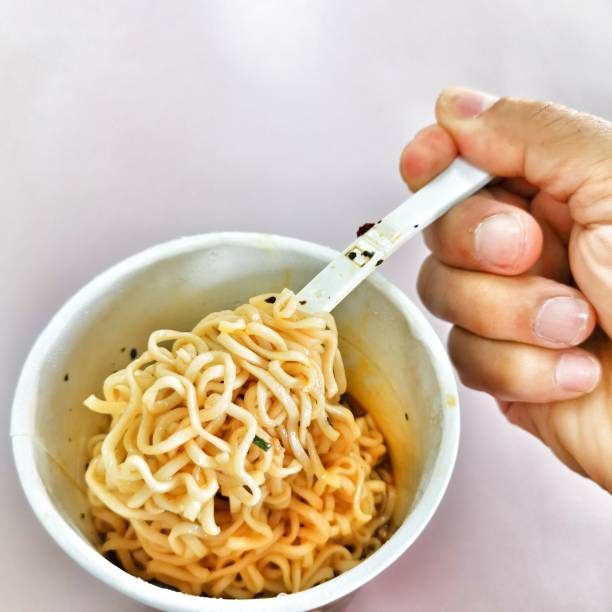istock Noodles in cup food for work from home 1215457300
