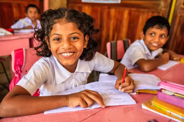 Sri Lankan school children in classroom, Sigiriya, Ceylon.