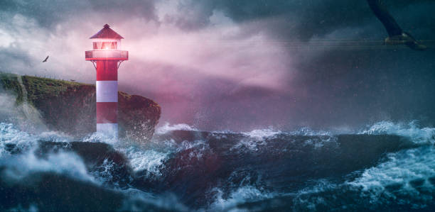 farol na tempestade - lighthouse storm sea panoramic - fotografias e filmes do acervo