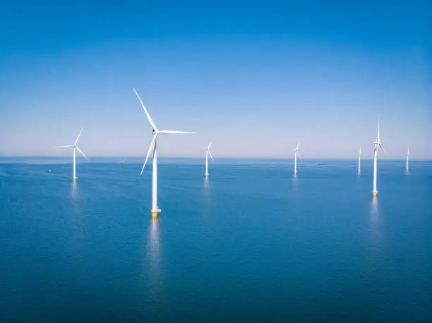 Wind turbine from aerial view, Drone view at windpark westermeerdijk a windmill farm in the lake IJsselmeer the biggest in the Netherlands,Sustainable development, renewable energy Netherlands