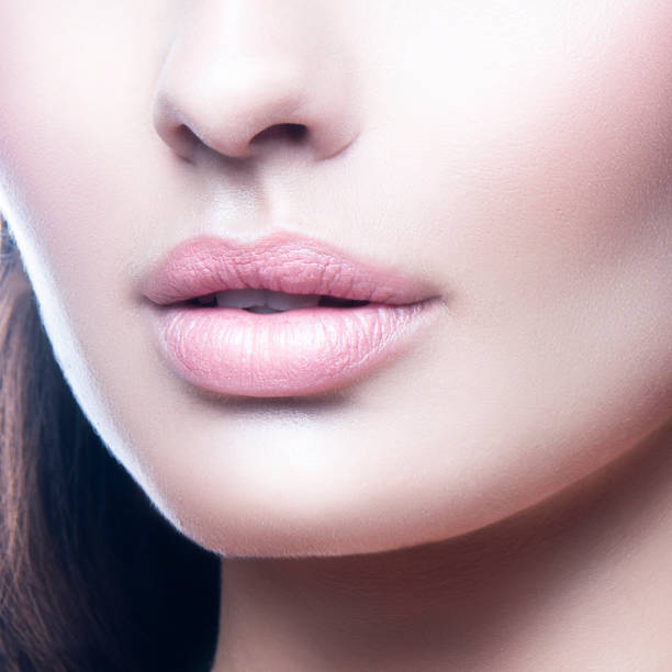 istock Pink female lips close-up, natural 1215464043