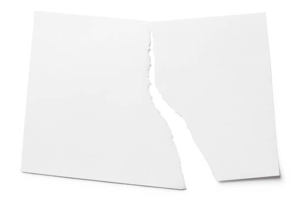 istock Torn sheet of paper on white 1215464669