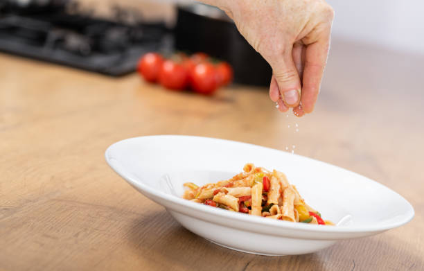 istock Penne Pasta With Tomato Sauce And Vegetables 1215465422