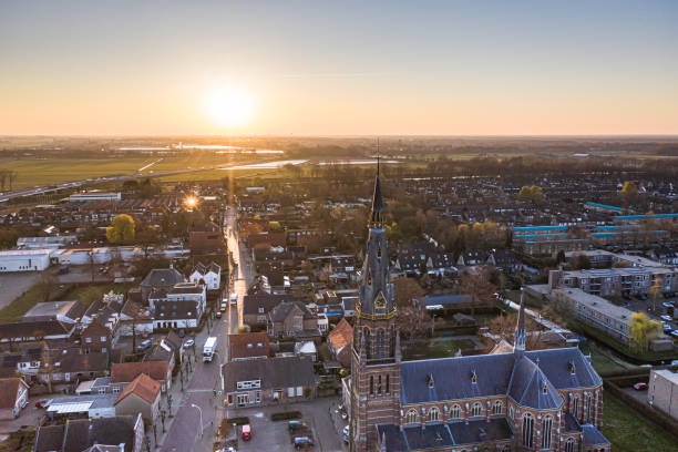 The town seen from above during sunrise in Waalwijk, Noord Brabant, Netherlands The town seen from above during sunrise in Waalwijk, Noord Brabant, Netherlands berkel stock pictures, royalty-free photos & images