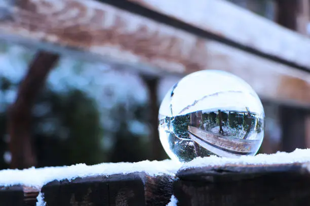 Lensball in snow ice particules