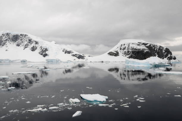 istock Icebergs and Errera Channel Coastline, Antarctic Peninsula 1215468823