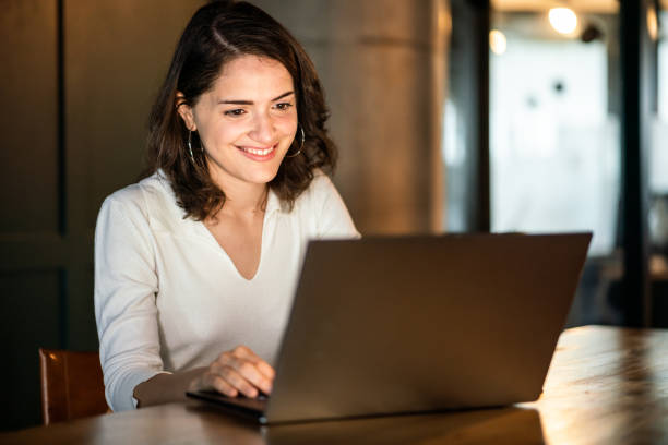 istock Young Argentinian woman working on her laptop 1215470132
