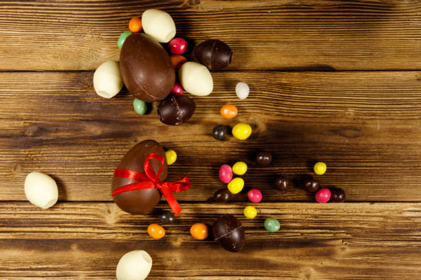 istock Easter composition with chocolate eggs on wooden background 1215471339