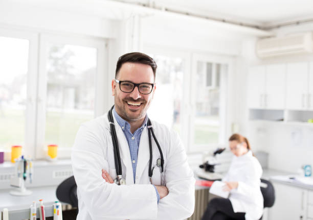 istock Doctor with crossed arms in laboratory 1215473002