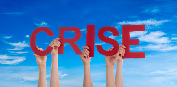 istock People Hands Holding Word Crise Means Crisis, Blue Sky 1215473946