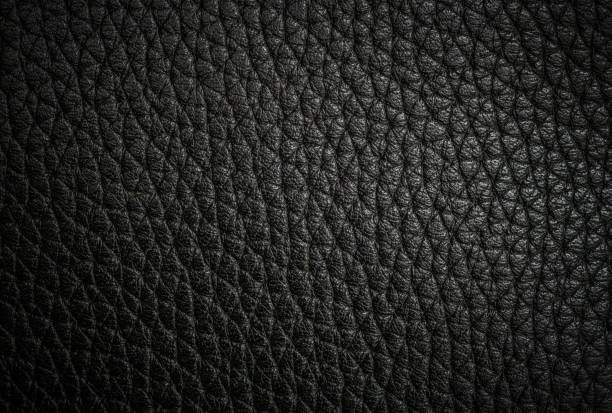 istock background and texture of real black leather sheet 1215476950