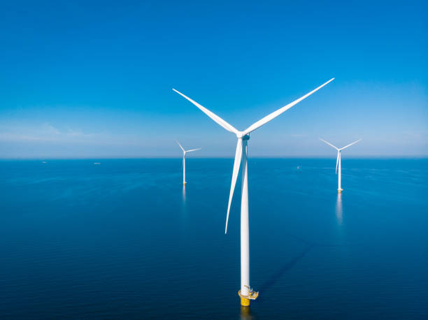 wind turbine from aerial view, drone view at windpark westermeerdijk a windmill farm in the lake ijsselmeer the biggest in the netherlands,sustainable development, renewable energy - bohrinsel stock-fotos und bilder