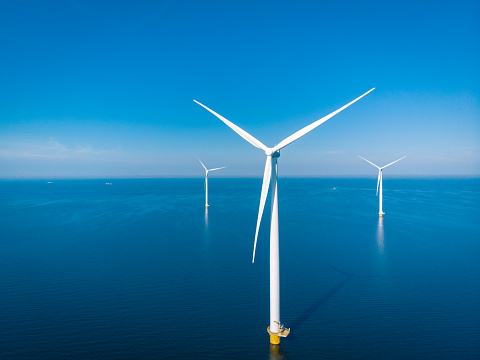 Wind turbine from aerial view, Drone view at windpark westermeerdijk a windmill farm in the lake IJsselmeer the biggest in the Netherlands,Sustainable development, renewable energy Netherlands