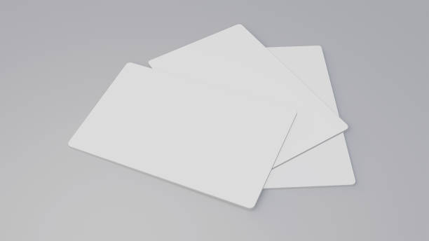 istock White gift card credit card mockup stacking on grey table background. Object background for business branding presentation template print 3.370 x 2.125 inch paper size cover. 3D illustration rendering 1215479347