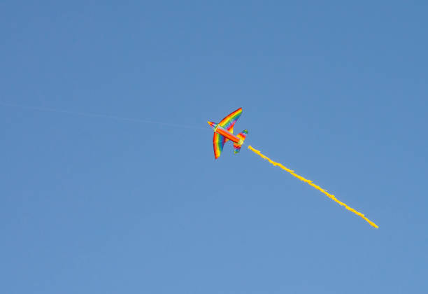 istock Colorful kite flying in the blue sky. 1215481947
