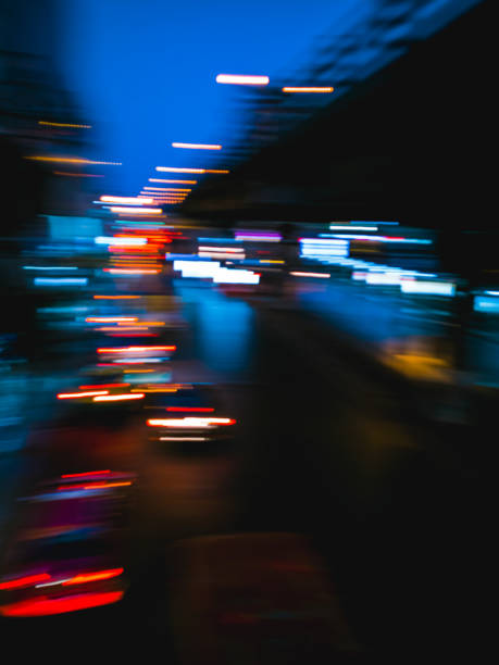 Slow Speed Shutter and Movement Abstract of Car Lighting on the Street. Slow Speed Shutter and Movement Abstract of Car Lighting on the Street. long shutter speed stock pictures, royalty-free photos & images
