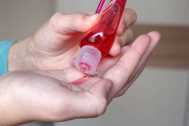 istock hands are treated with antiseptic gel 1215487634