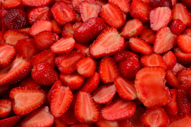 istock Strawberry slices. Fresh berries macro. Fruit background. Top view. 1215489903