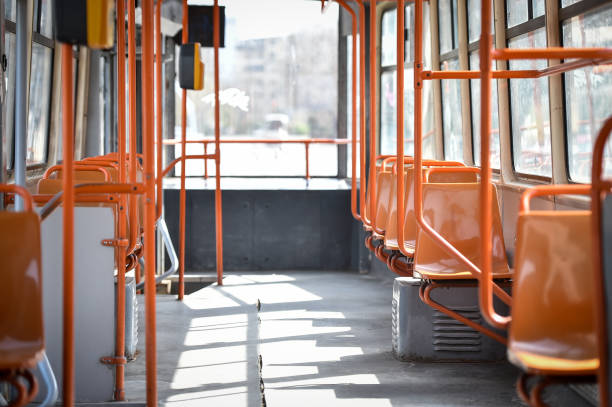 istock Empty orange chairs in an empty public tram during coronavirus pandemic 1215489983