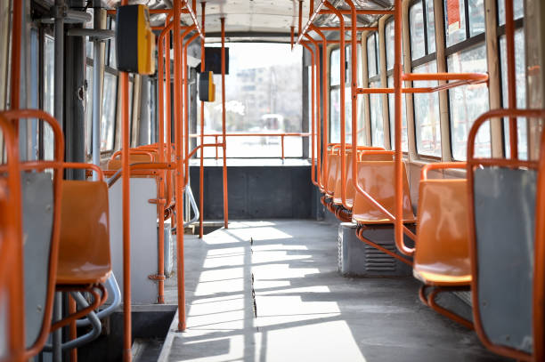 istock Empty orange chairs in an empty public tram during coronavirus pandemic 1215489996