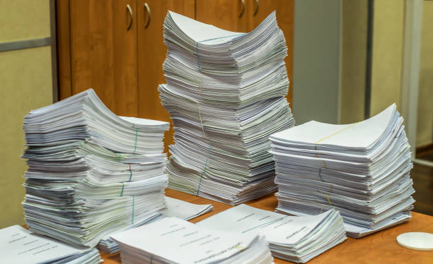 istock pile of paper documents in the office 1215492520