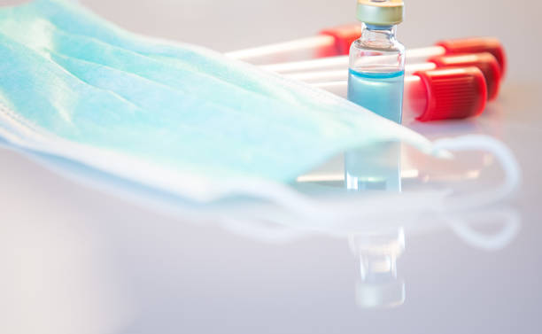 istock Coronavirus pandemic vaccine research background 1215492522