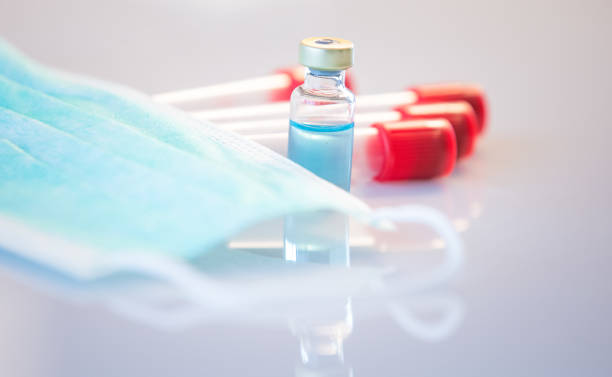 istock Coronavirus pandemic vaccine research background 1215492533