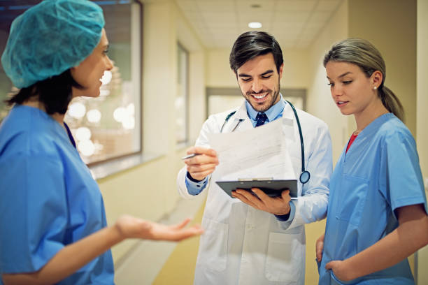 istock Doctor and nurses in hospital 1215495878