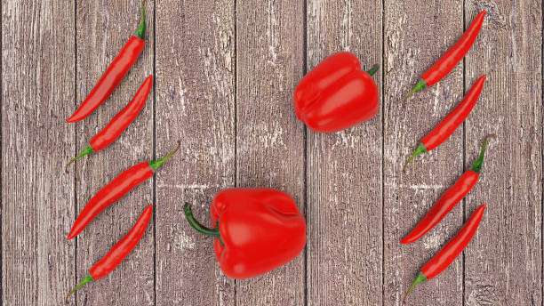 istock Chilli and bell pepper mix top view on the wooden table 1215501241