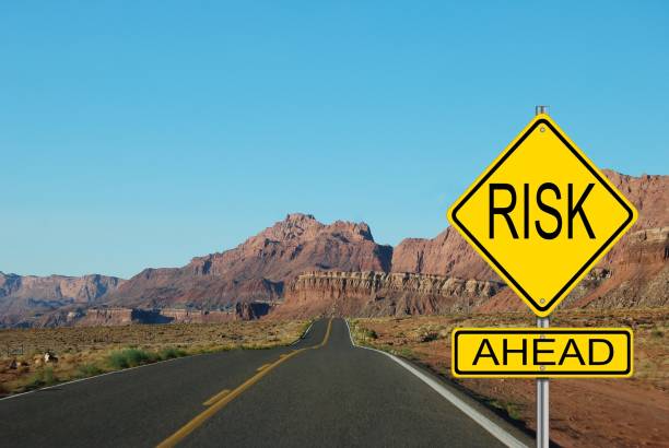 istock Road sign with rocky background 1215505261