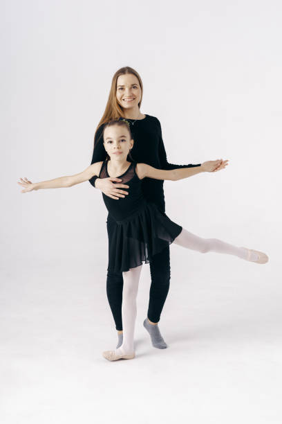 istock Mother daughter moments on white background 1215507523
