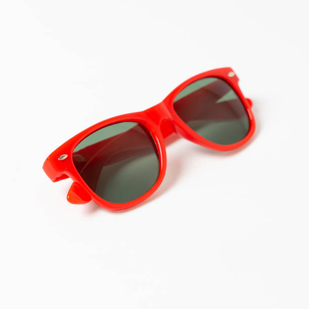 istock red plastic sunglasses isolated on white background 1215507619