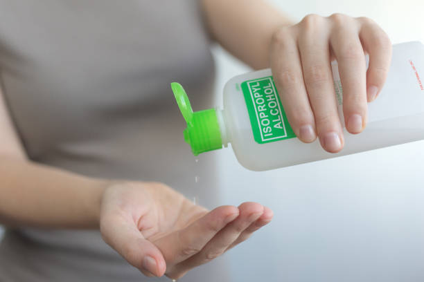 istock Rub spray hands with alcohol, protection against coronavirus. Close up 1215509136