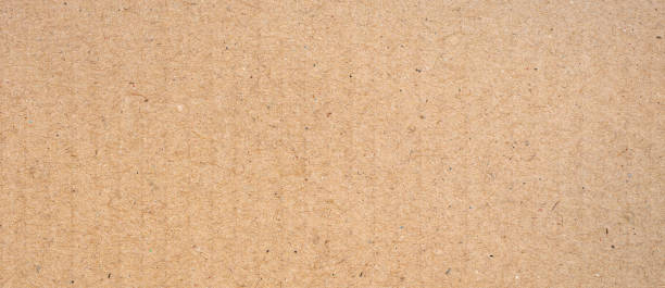 istock brown paper box background and texture with copy space 1215509269