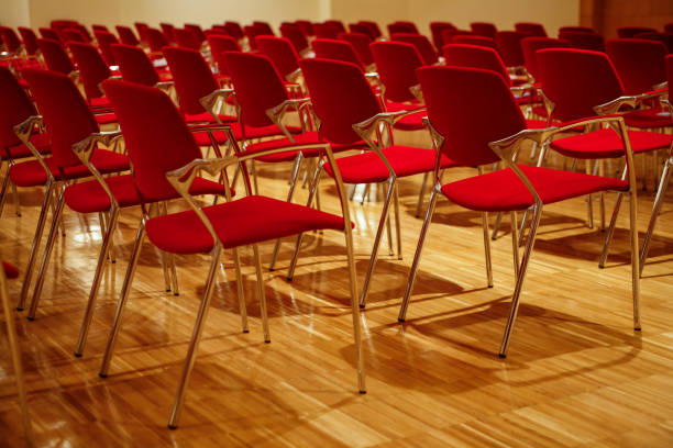 istock Rows of empty chairs waiting for the public. 1215518089