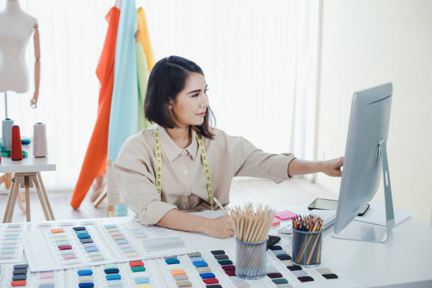 istock Designer are thinking and designing clothes for customers order items. 1215522079
