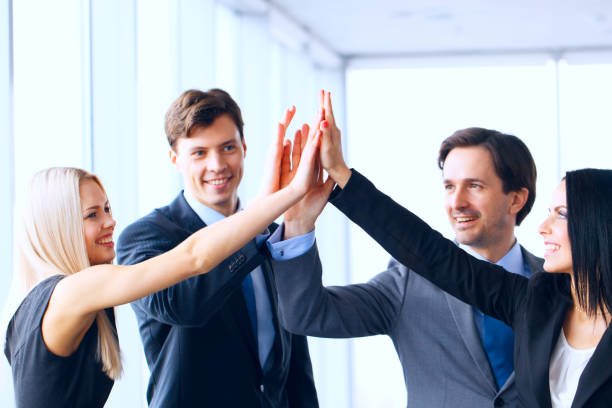 istock Successful business people celebrating 1215524475
