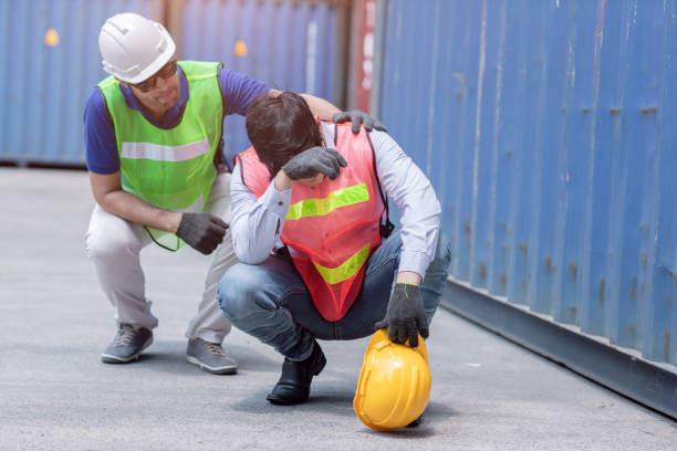istock worker tired sad from stressful from hard working with friend support. 1215525784