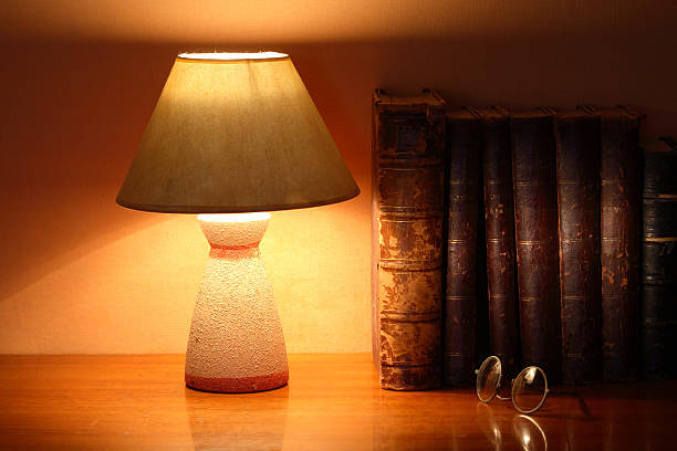 istock Desk Lamp And Old Books 121552729