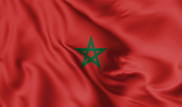 istock Morocco flag blowing in the wind. Background silk texture. 3d illustration. 1215530046