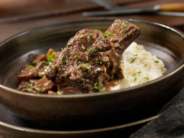 Red Wine Braised Beef Short Ribs With Mashed Potatoes Red Wine Braised Beef Short Ribs With Mashed Potatoes braised stock pictures, royalty-free photos & images