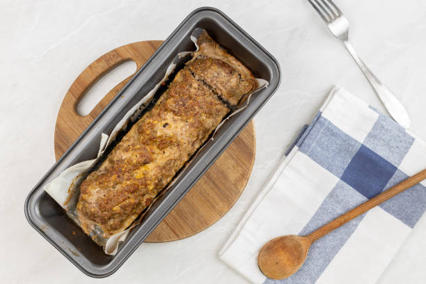 istock Minced meat meatloaf baked and served on the table 1215534172